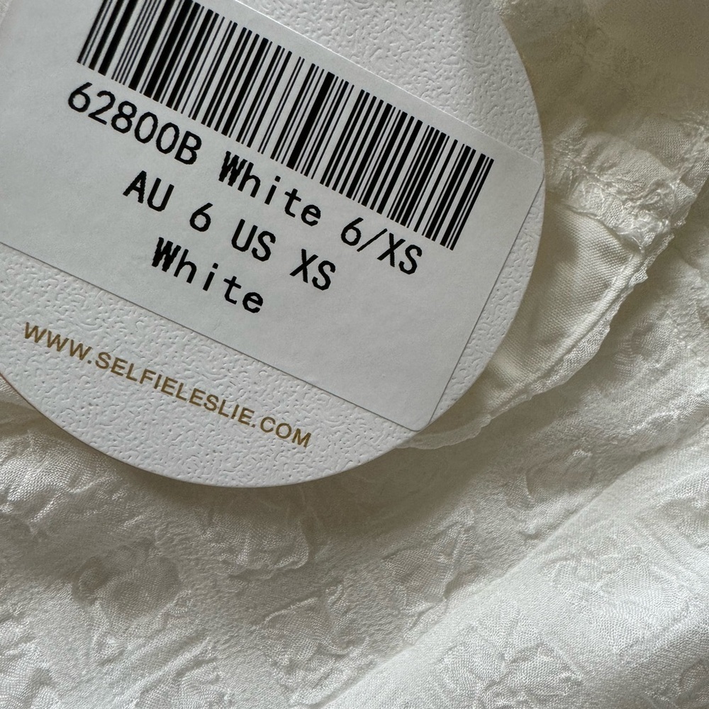 SELFIE LESLIE JANIE STRING TIE DETAIL RUFFLE HEM BABYDOLL DRESS WHITE - Picture 8 of 8